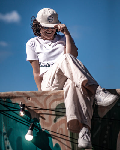 Bucketty's White Cropped T-shirt with Green Graphic Design