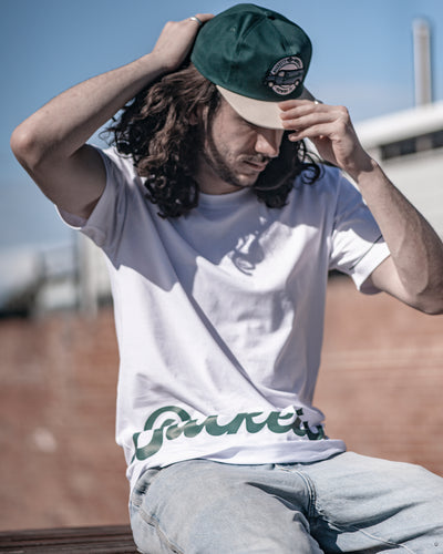 Bucketty's White Long T-shirt with Green Graphic Design