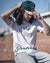 Bucketty's White Long T-shirt with Green Graphic Design